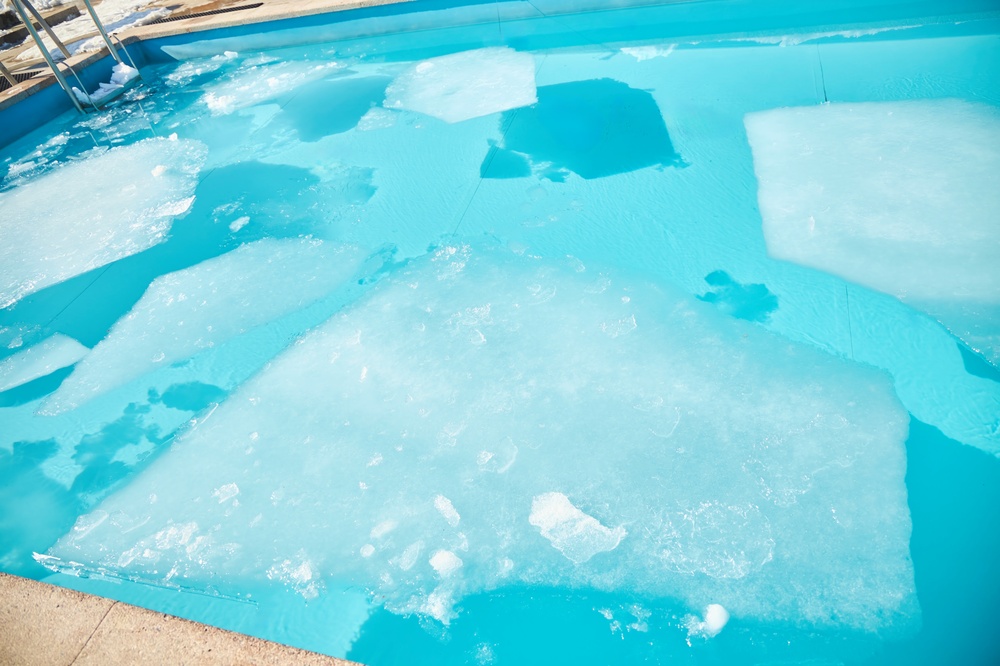 How Cold Weather Affects Your Pool’s Plumbing and Surface — And How to Protect It